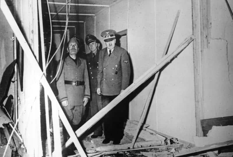 Adolf Hitler with Italian Fascist leader, Benito Mussolini, at the Wolf's Lair headquarters - inspecting damage following an assassination attempt