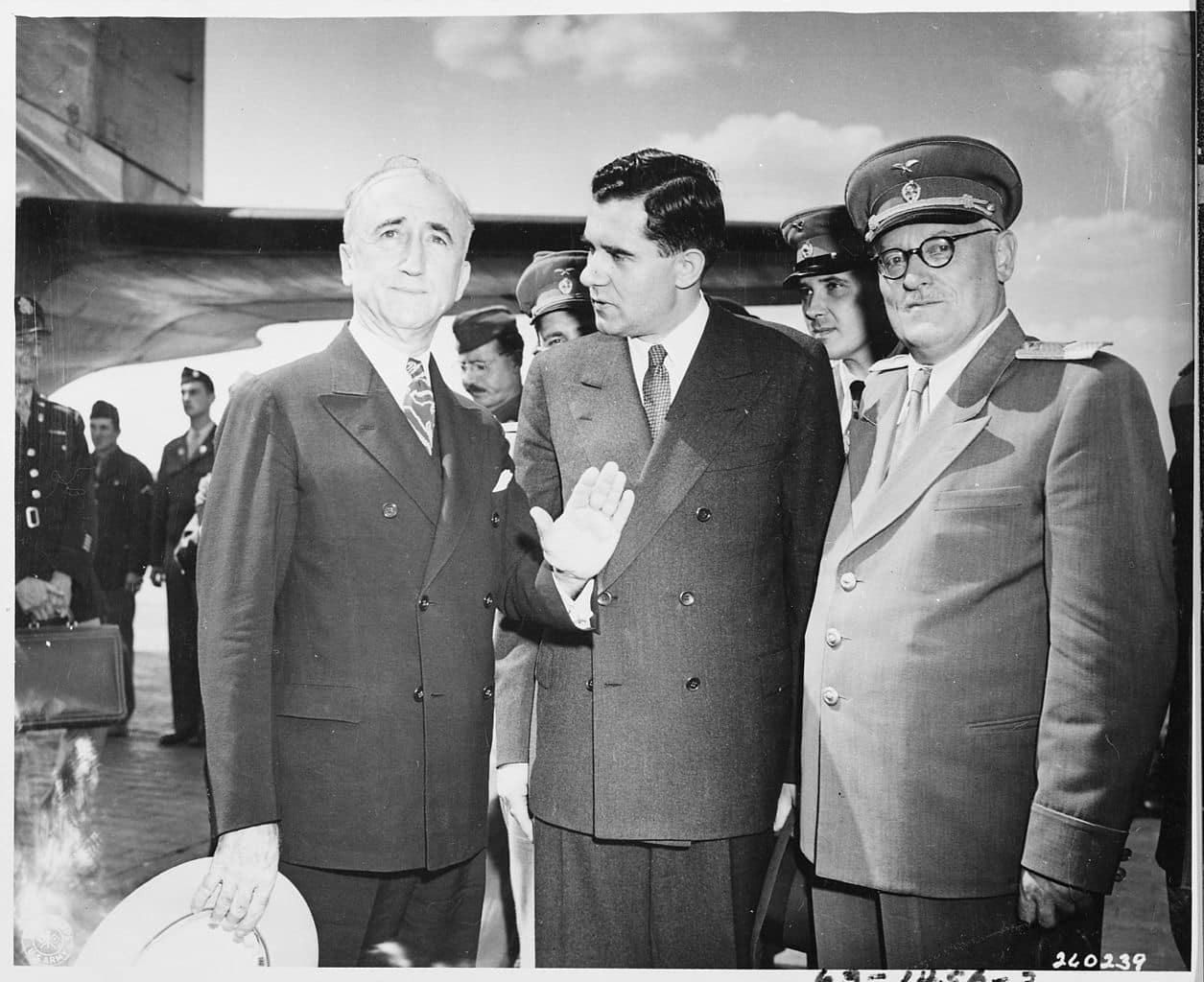 The Potsdam Conference - July 27th 1945 - Secretary of State James Byrnes (left) - seen here greeting Soviet Ambassador to the United States, Andrei Gromyko (center) - would be an essential part of Truman's negotiating team//Image: US National Archives and Records