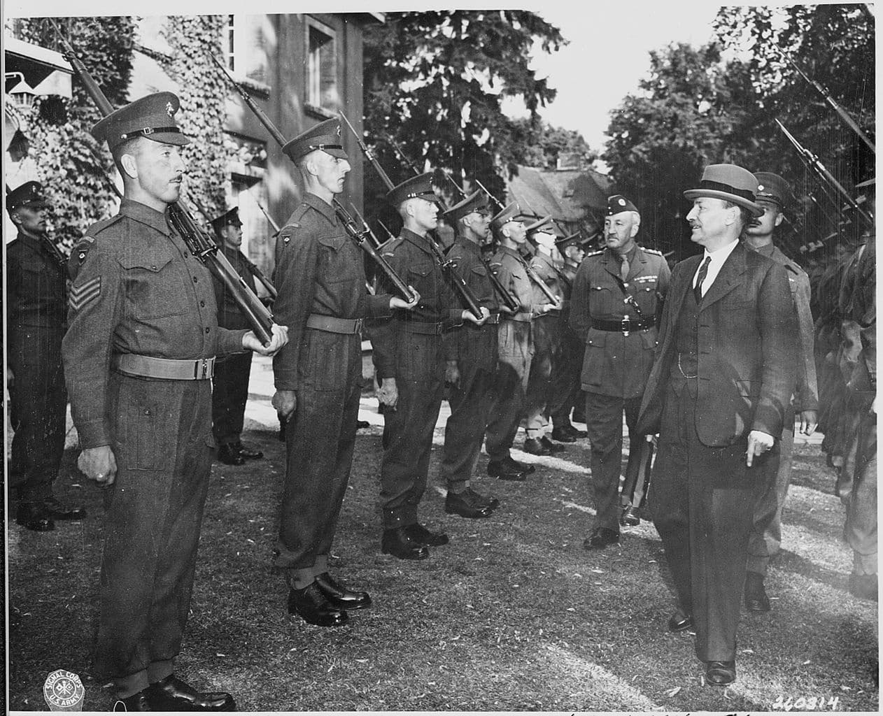 The Potsdam Conference - July 28th 1945 - UK Prime Minister Clement Attlee inspects the honour guards consisting of Scots Guards on the lawn of his villa