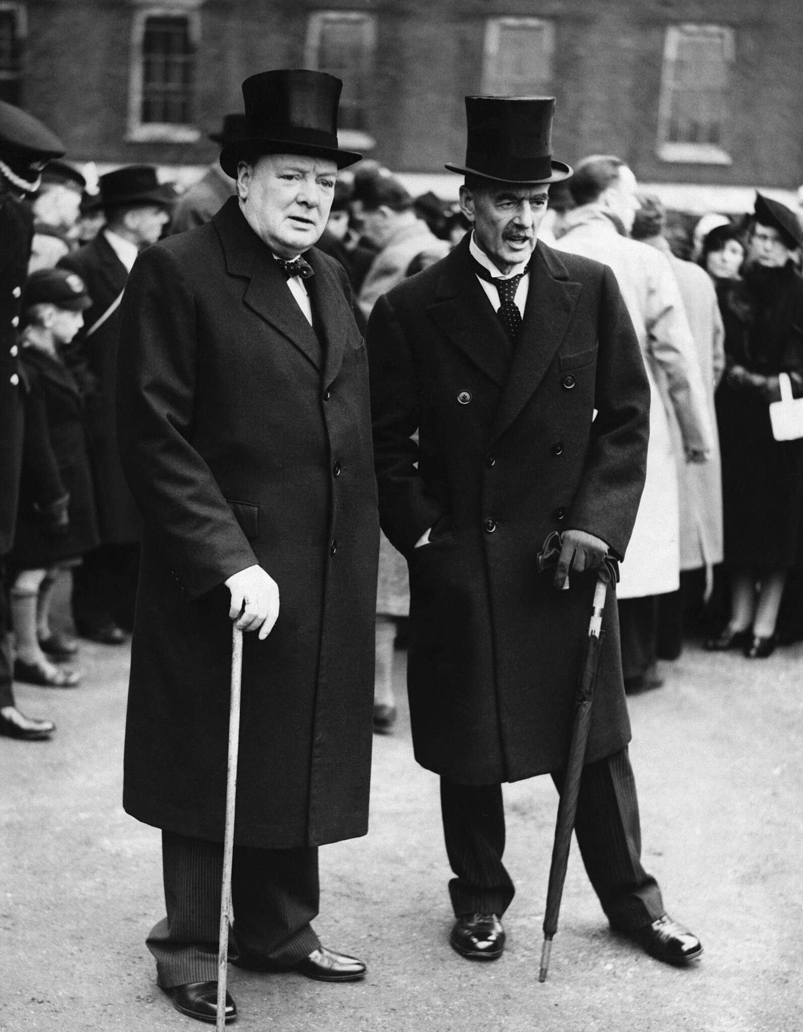 Neville Chamberlain (right) stood next to Winston Churchill (left) - 1935
