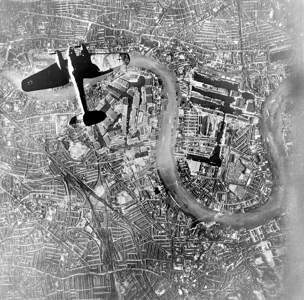 A German Luftwaffe Heinkel He 111 bomber flying over Wapping, London at the start of the Luftwaffe's evening raids of September 7th 1940 - Public Domain