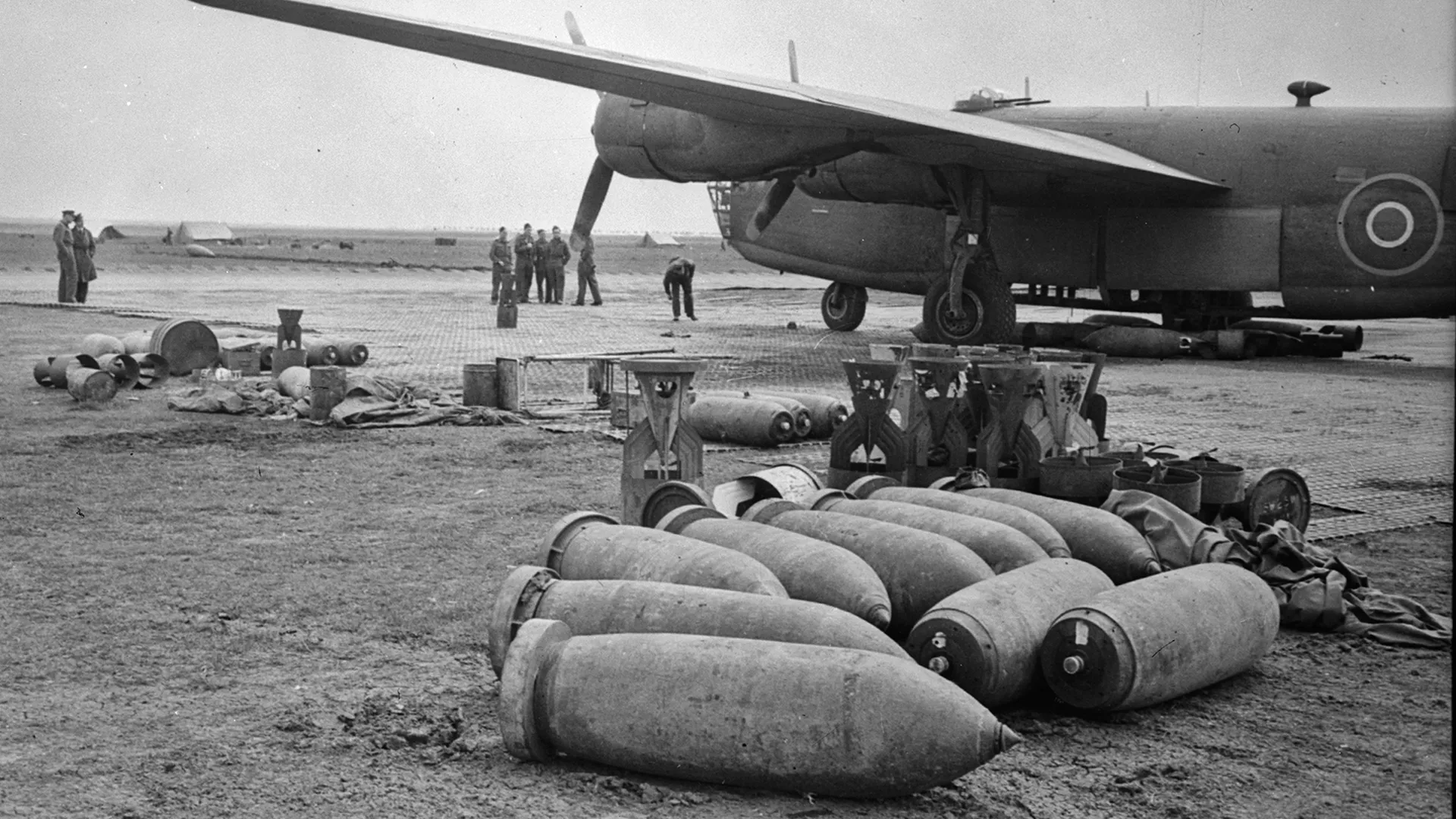 A Vickers Wellington being loaded with bombs in 1943 for a raid on Germany - IWM