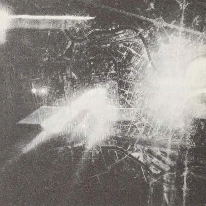 A aerial shot from an RAF night raid on Berlin (1943) - Public Domain