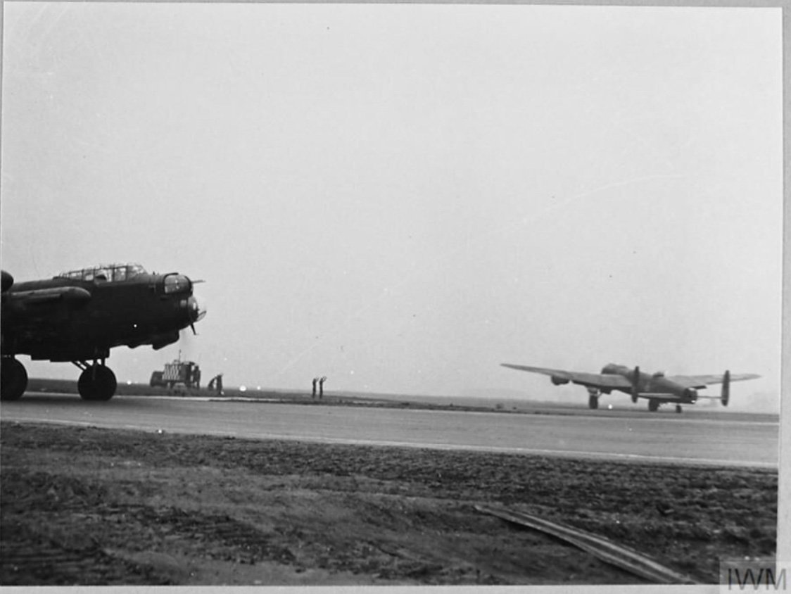 An RAF Lancaster bomber awaiting takeoff for an attack on Berlin (March 1944) - IWM