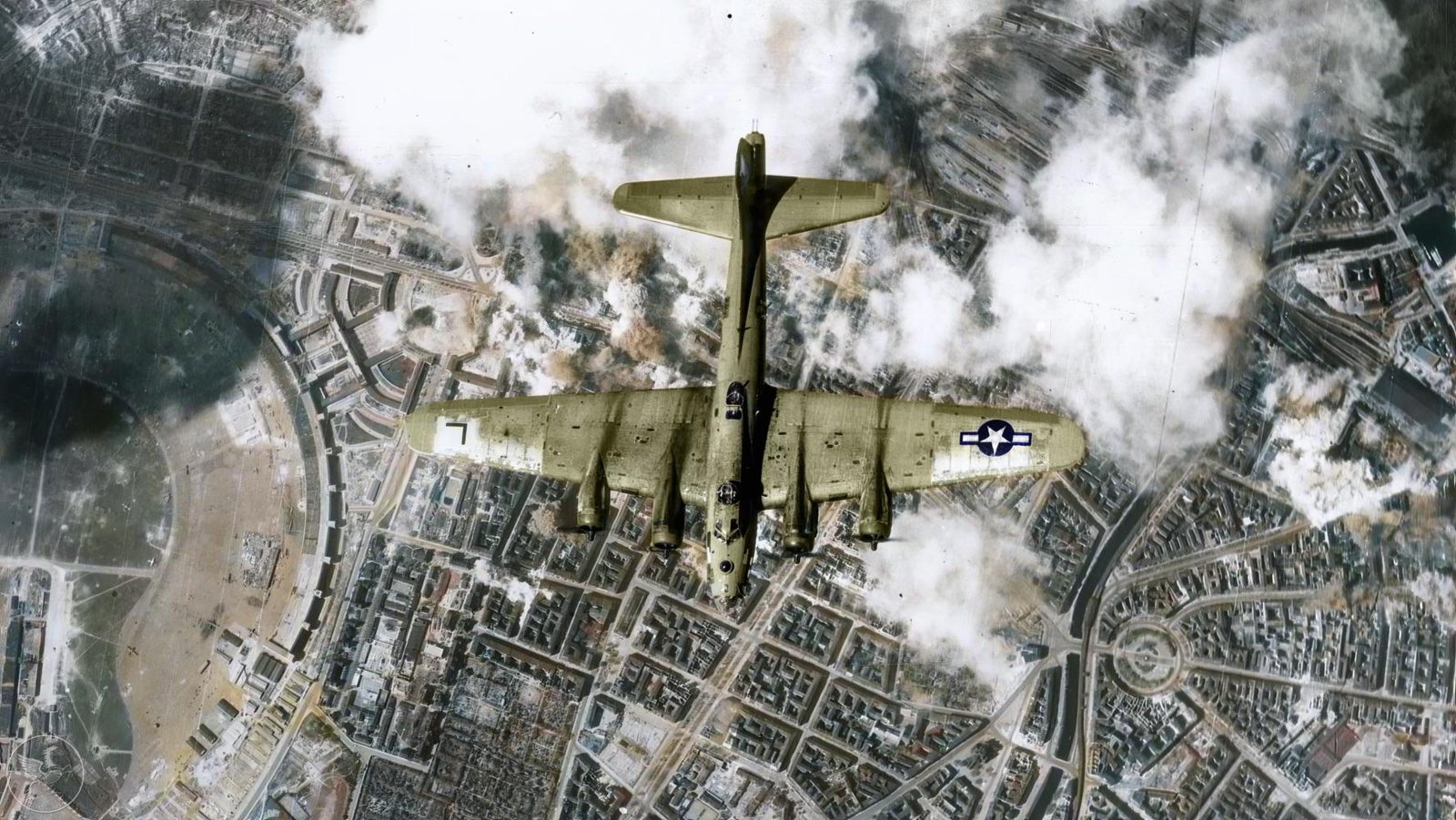 A US B-17 of the 452nd Bomb Group flying over Berlin with Tempelhof Airport visible below - Public Domain