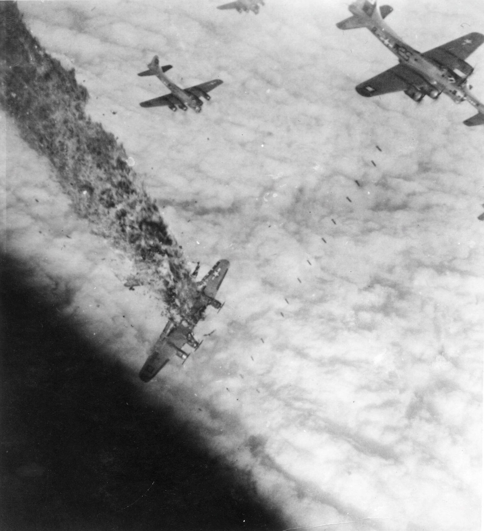 B-17 Flying Fortress “Blue Streak” going down in flames after being hit by flack over Merseburg, Germany on November 2nd 1944 - Public Domain