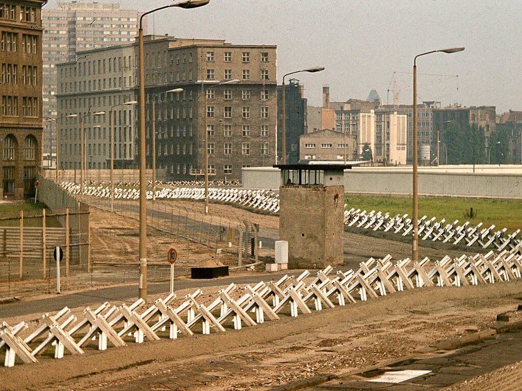 The 'Grenzmauer 75' and the 'Death Strip' of the Berlin Wall with visible Czech Hedgehogs - George Garrigues