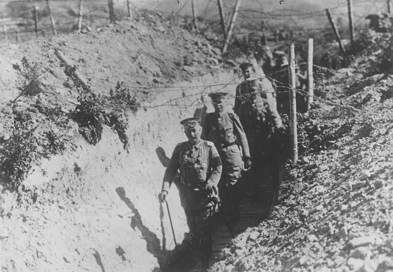 Kaiser Wilhelm II crosses a communication trench during a visit to the front on April 4th 1918, during the Spring Offensive - Public Domain