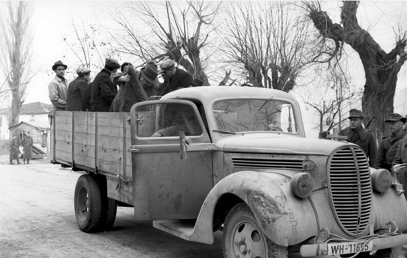 Deportation of members of the Jewish community in Ioannina, Greece using Ford trucks (1944) - German Federal Archives, Image 101I-179-1575-17 / Wetzel / CC-BY-SA 3.0