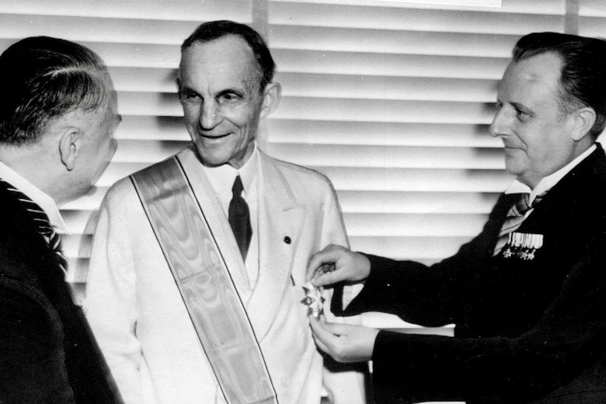 Henry Ford receiving the Grand Cross of the German Eagle from Nazi officials, July 30th 1938, on his 75th birthday - Public Domain