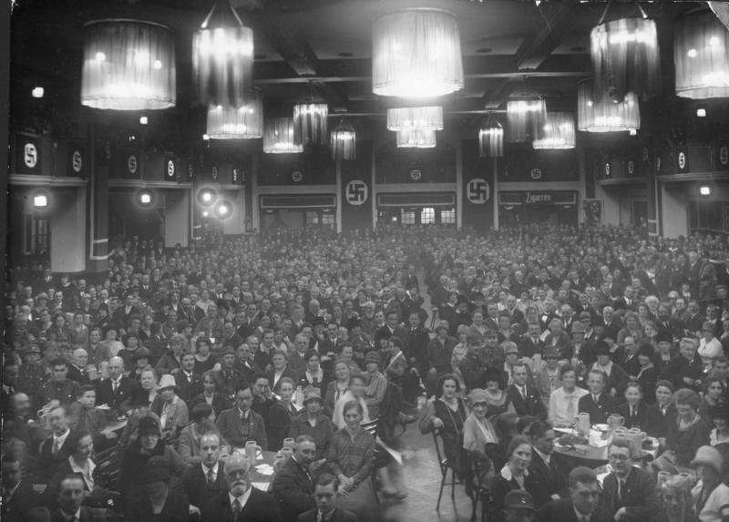 Nazi Party meeting in the Bürgerbräukeller (1923) - Public Domain