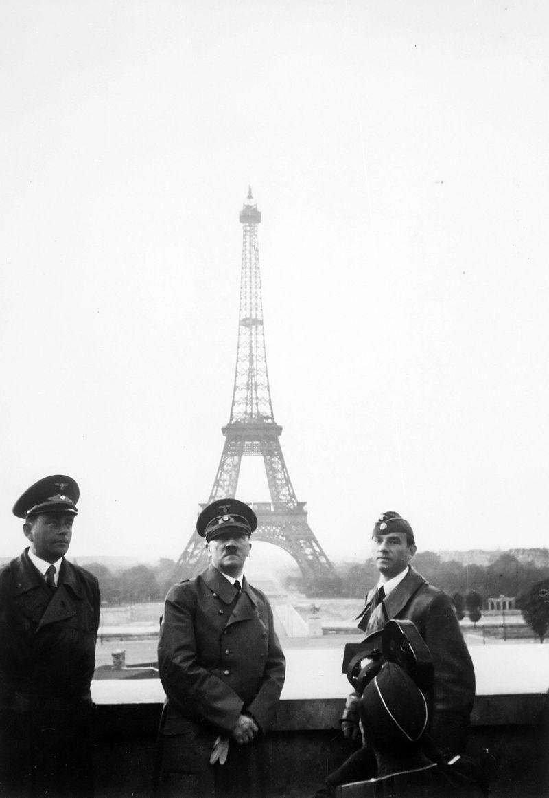 Adolf Hitler on tour in Paris in 1940 after the invasion of France; with arhitect, Albert Speer (left), and sculptor, Arno Breker (right) - Public Domain