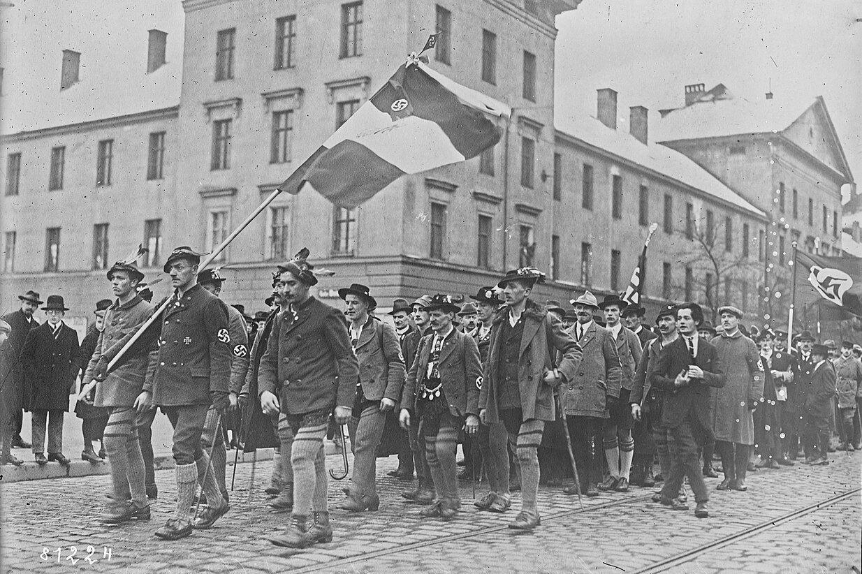 Bavarian Tyroleans and their Nazi banner parading in Munich (1922) - Public Domain