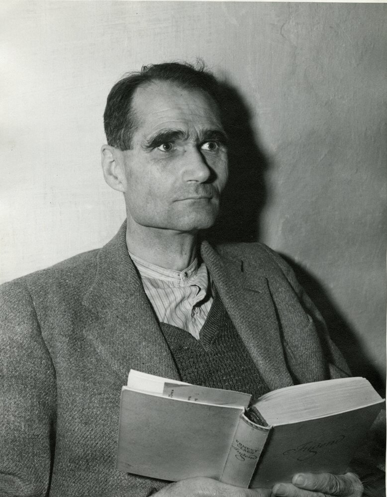 Rudolf Hess reads "Jugend" by Ernest Glass in his cell at the Nuremberg prison while on trial before the International Military Tribunal - Public Domain