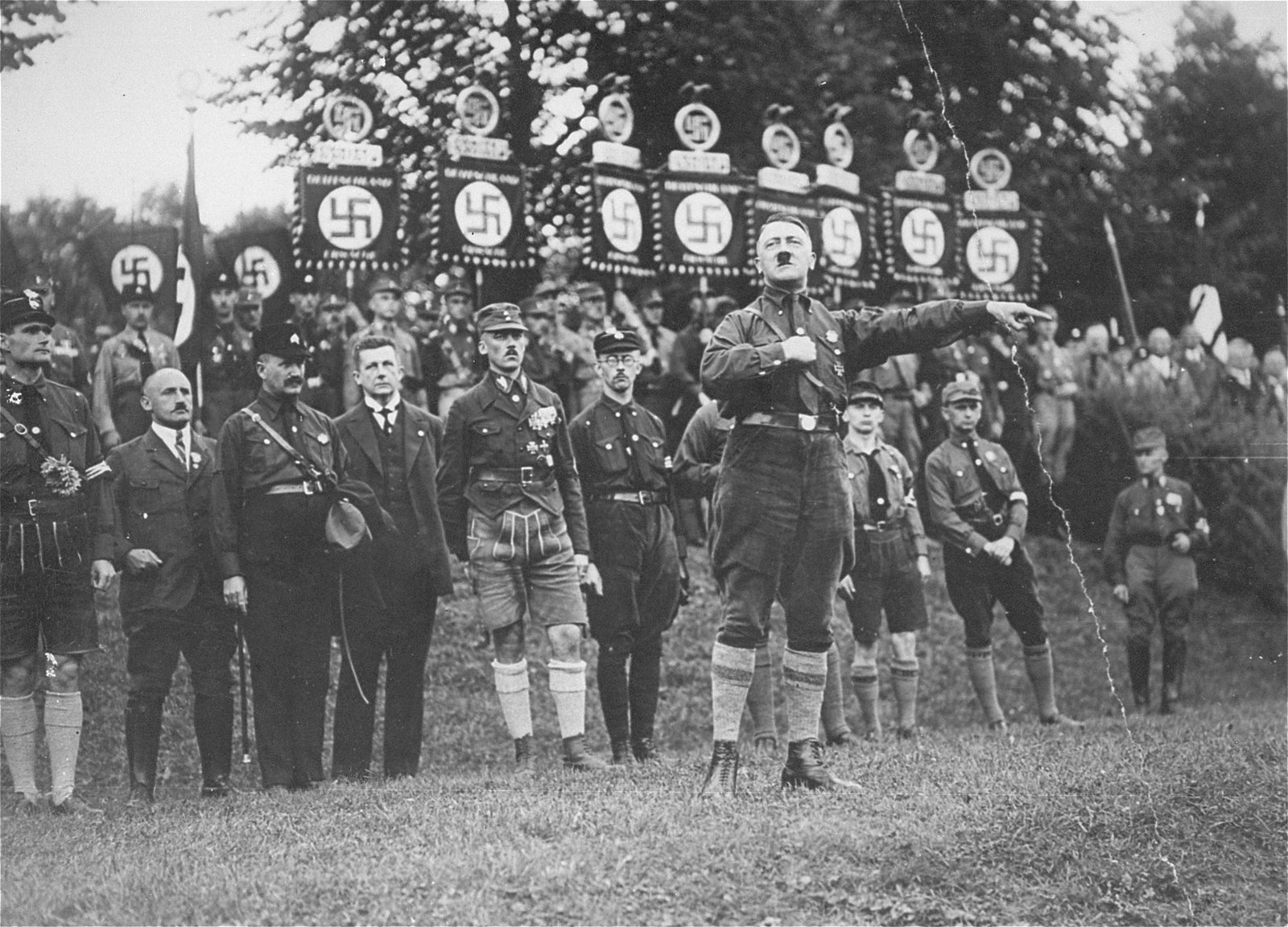 Rudolf Hess (first from left) at the first official Nuremberg Rally of the Nazi Party in 1927 - Public Domain