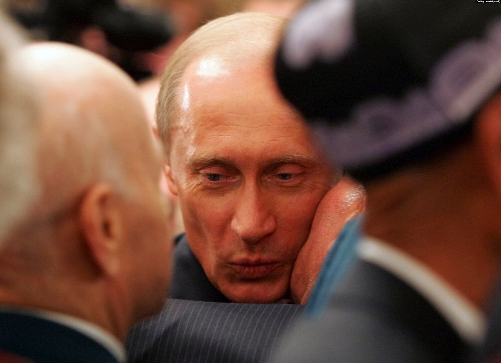 The reported last instance of an official Soviet Kiss in 2005 as Vladimir Putin dodged a WWII veteran - Public Domain